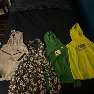 4 youth Large Nike hoodies.